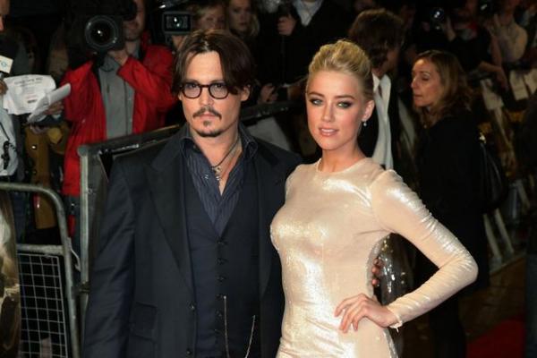 Johnny+Depp+and+Amber+Heard+arriving+for+the+European+Premiere+of+The+Rum+Diary,+at+Odeon+Kensington+in+West+London